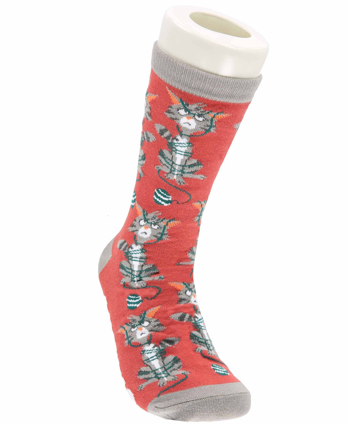 A single crew sock displayed on a white mannequin leg form against a plain white background. The sock is coral red with a repeating pattern of cartoon cats wrapped in yarn in gray, white, with gray ribbed cuffs, heels, and toes.