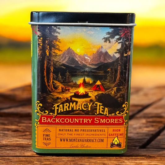 Montana Farmacy Tea Backcountry S'mores packaging with a scenic design on a wooden surface.