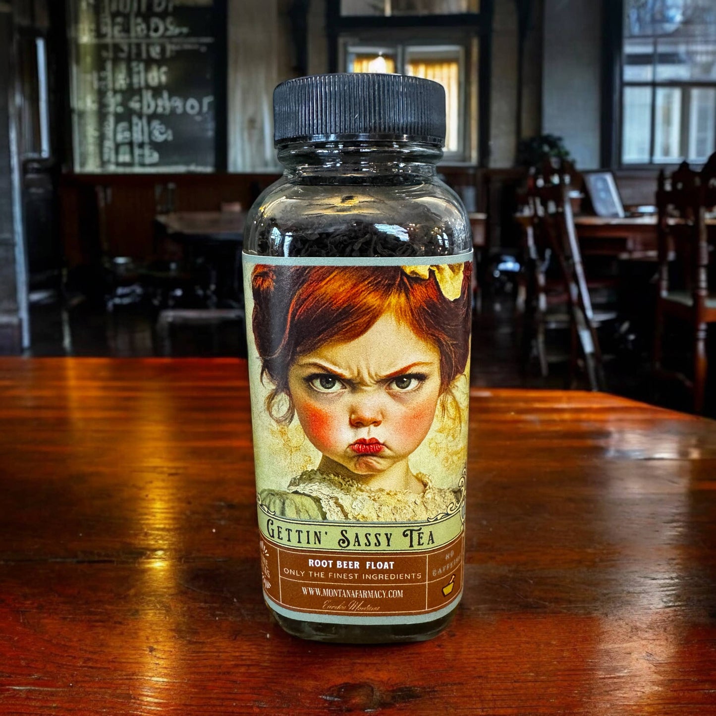 Bottle of 'Gettin' Sassy Tea' on a wooden table in a bar setting