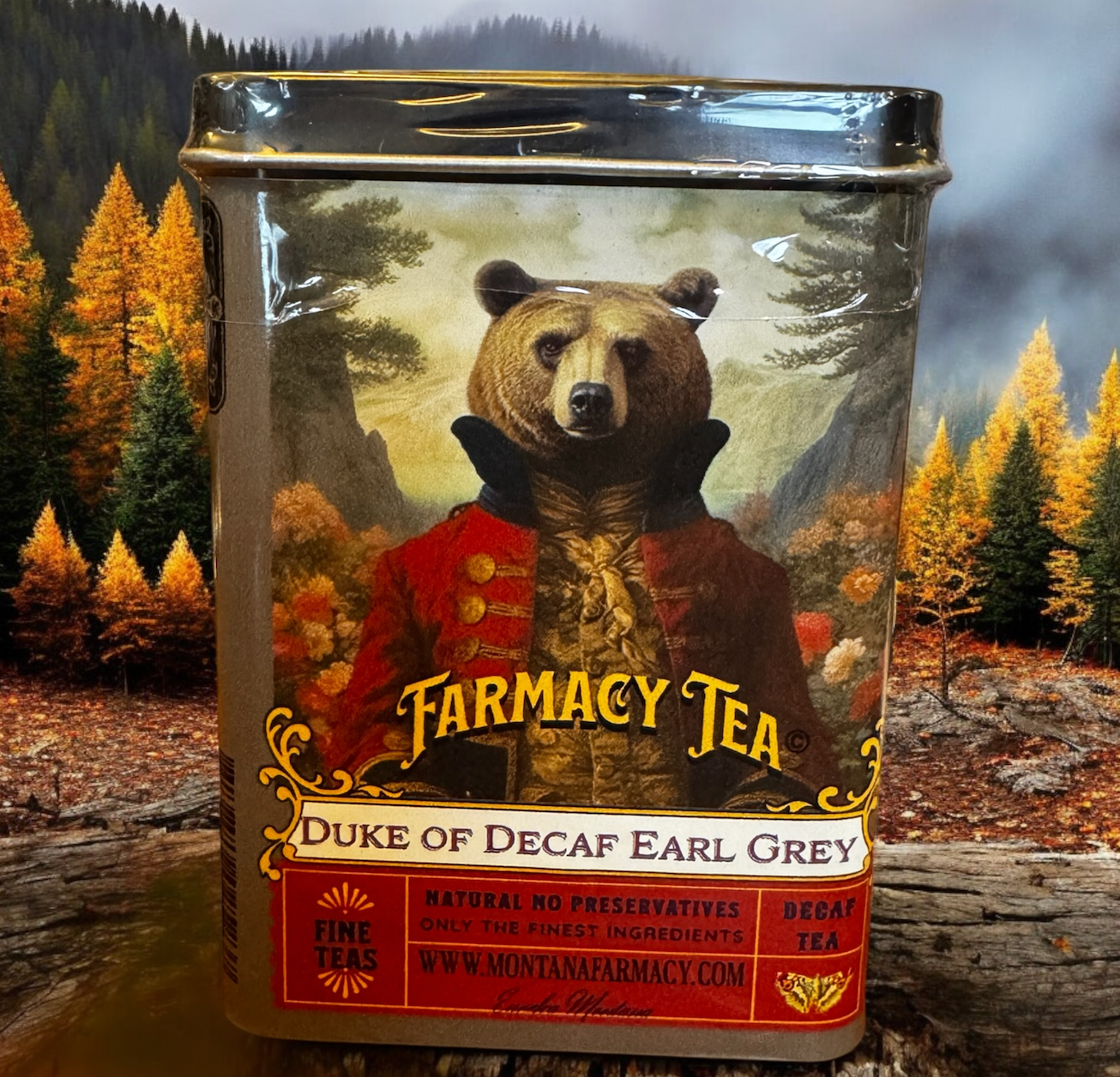 Montana Farmacy Tea Tin with a bear wearing clothes on the label, with a wilderness background