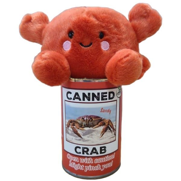 Canned Crab stuffed plush toy on top of a silver pop-top can with jokes printed on label — novelty gift