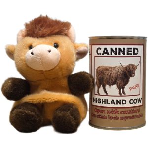 Canned Highland Cow stuffed plush toy beside a silver pop-top can with funny jokes on label — unique gift