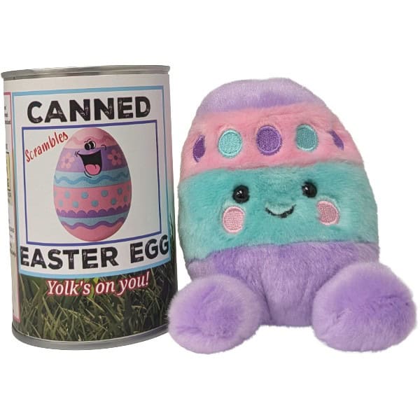 An Easter egg plush toy sitting beside a can labeled 'Canned Easter Egg' photographed on a plain white background