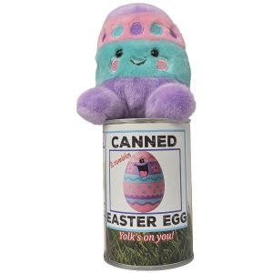An Easter egg plush toy sitting on top of a can labeled 'Canned Easter Egg' photographed on a plain white background.