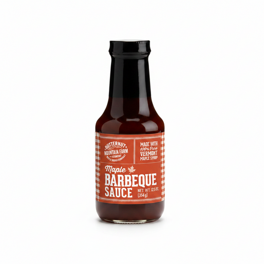 Bottle of Butternut Mountain Farm Maple Barbeque Sauce with a red label.