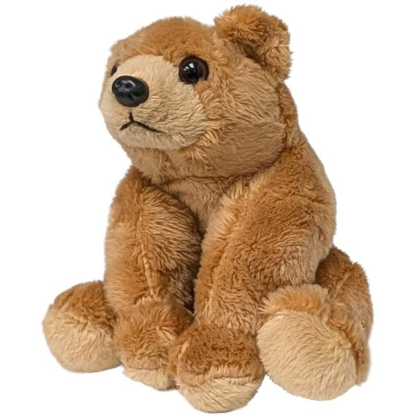 Plush teddy bear on a white background