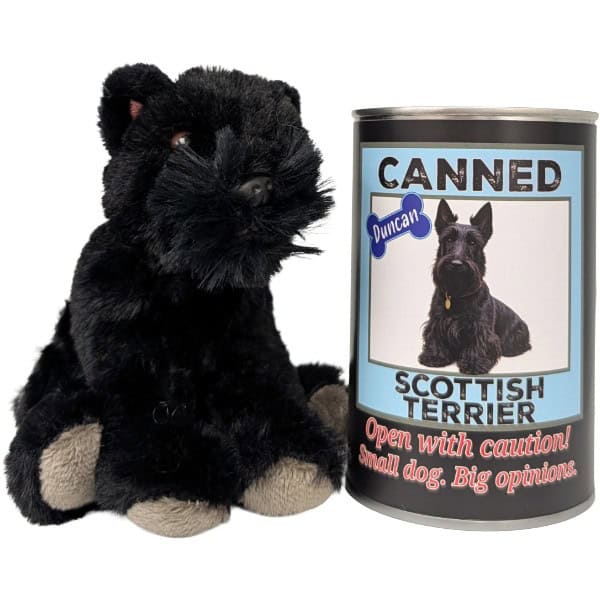 a black dog plush toy sitting next to a can labelled: Canned Scottish Terrier on a white background