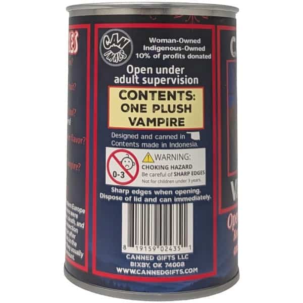 A cylindrical metal can of 'One Plush Vampire' by Cannied Gifts LLC, featuring a dark blue and red label with white and yellow text and warning labels.