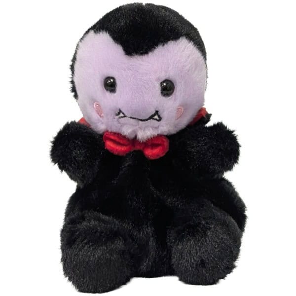 A plush vampire toy with black fur, a pale lavender face, small black eyes, a stitched mouth, and a red bow tie, shown against a plain white background.